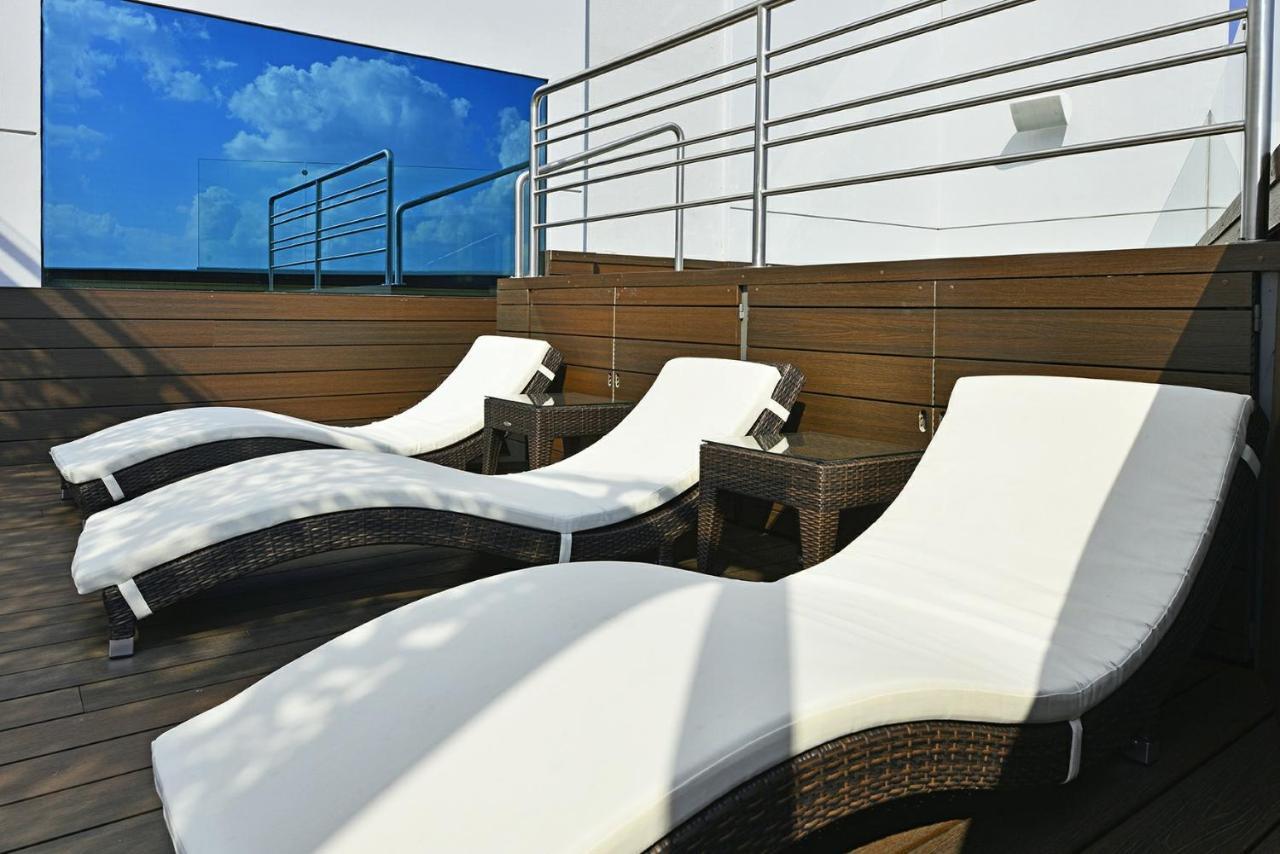 Baruk Guadalajara Hotel De Autor Kültér fotó Sunbathing chairs on the deck of a cruise ship